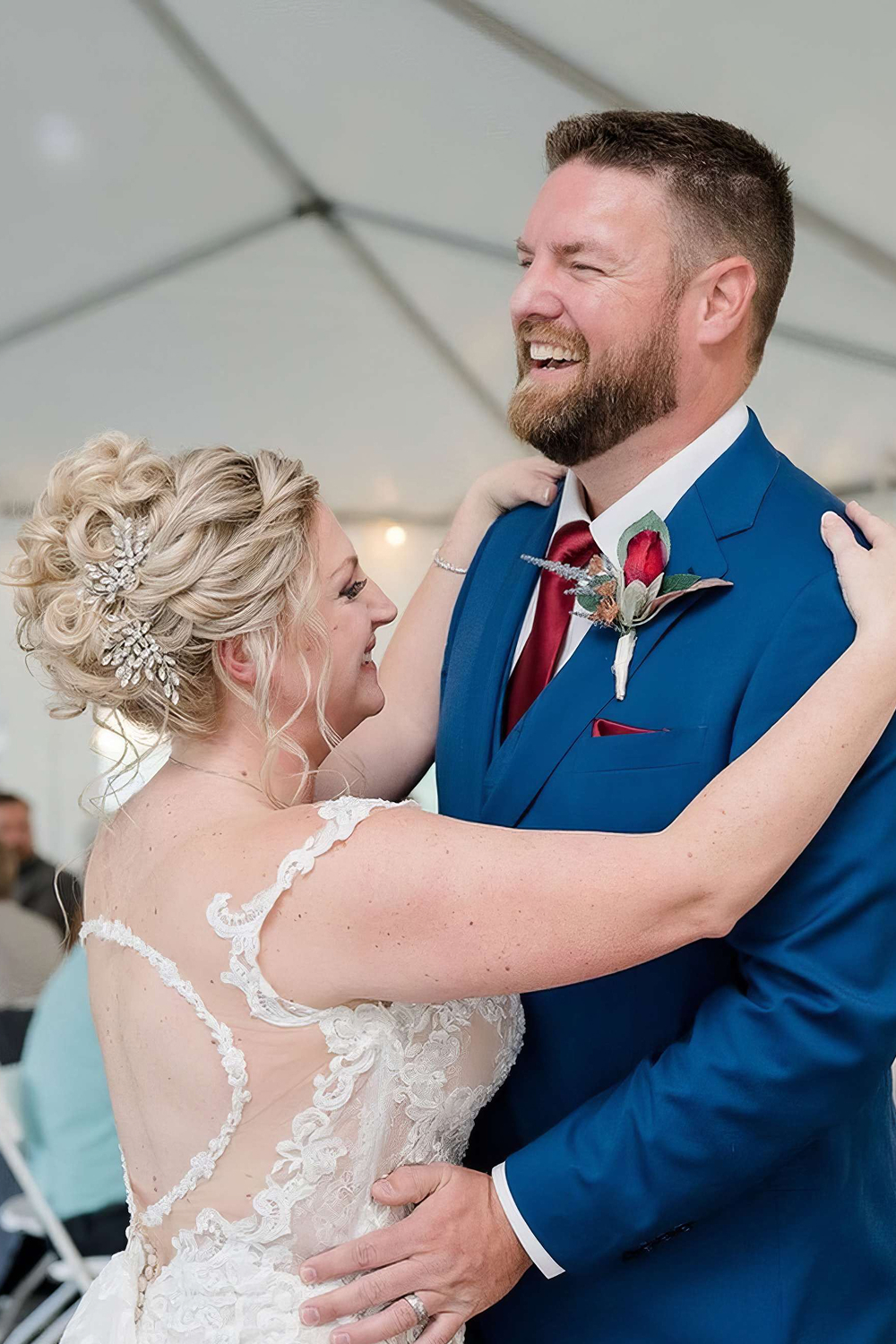 Blonde bride and groom in blue