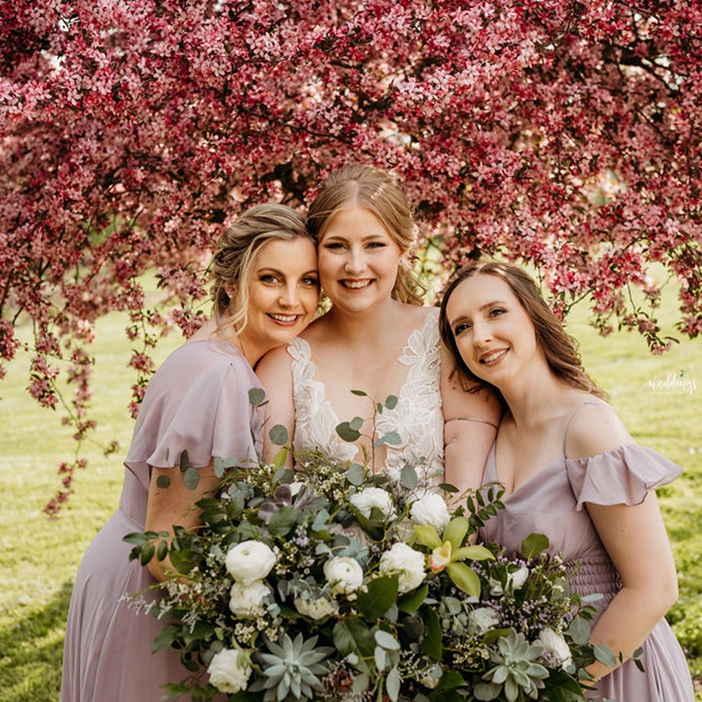 Bridesmaids with bouquet