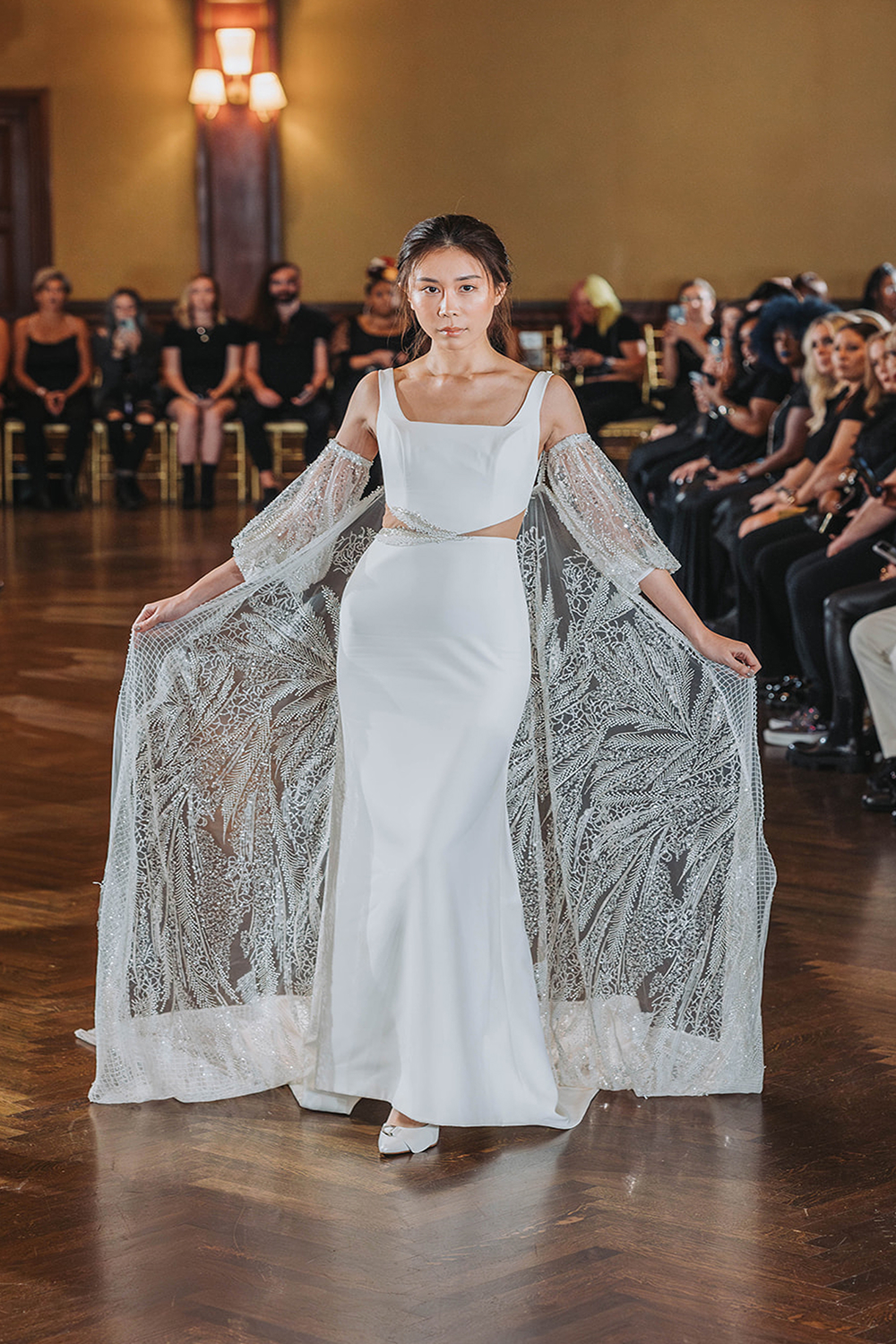Model in white dress with lace